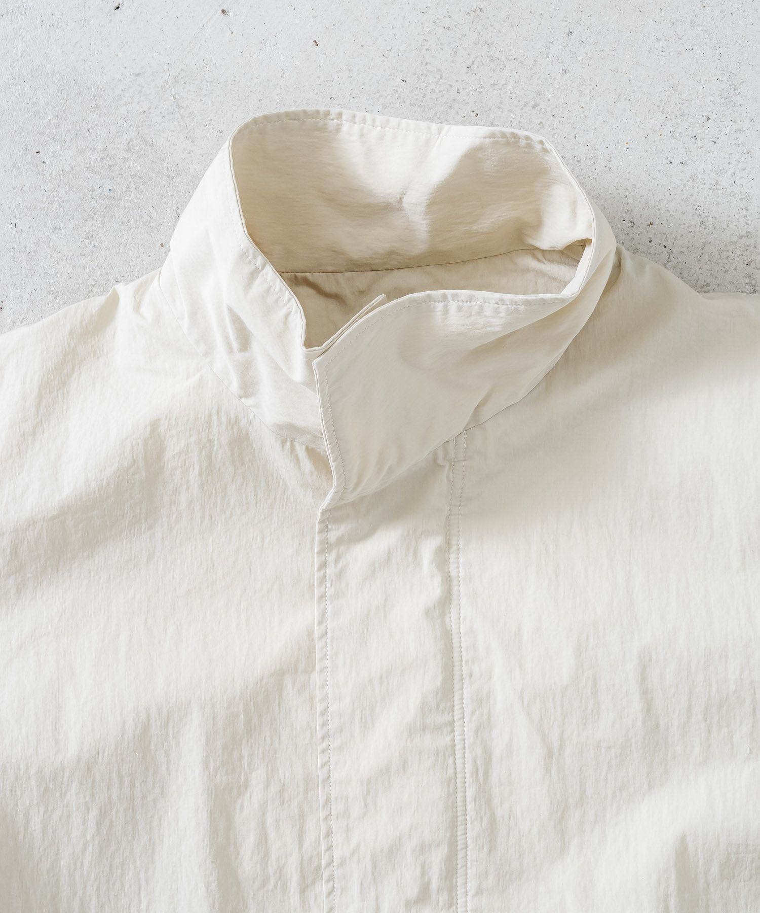 C/Nウェザークロス袖ゴムハイネックブルゾン | quadro (クオドロ) 公式